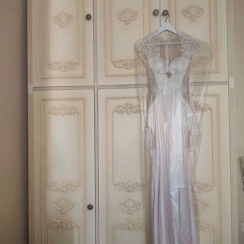 Three-door wardrobe used with carved vintage details and patina