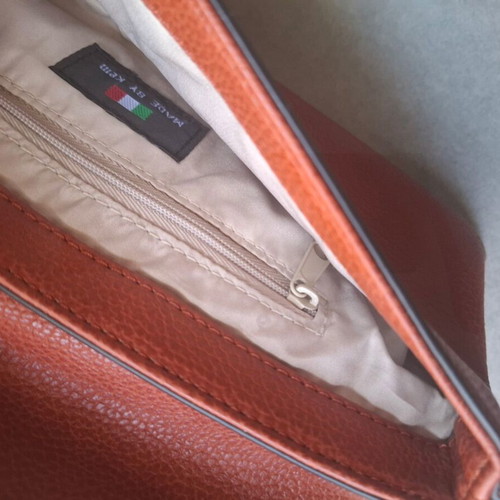 KEM wristlet clutch like new, burgundy embossed faux leather