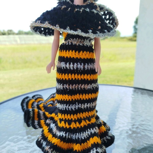 70s doll with handmade knitted clothes and metal stand