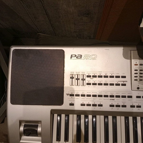 Kord PA 80 keyboard used with Ultimate Support case and Proel stand