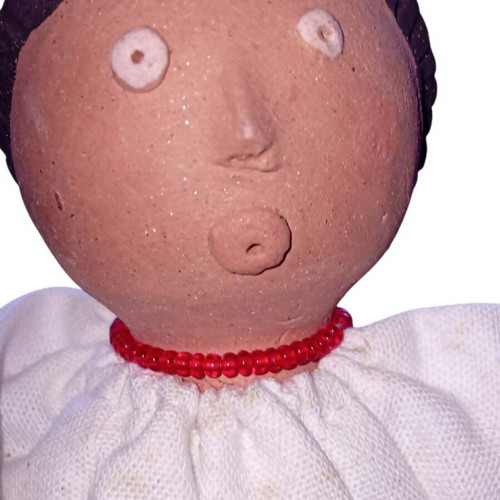 Handmade fabric doll with traditional folk costume used