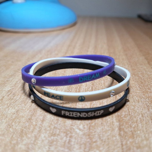 Rubber bracelets like new, set of 3, white and purple