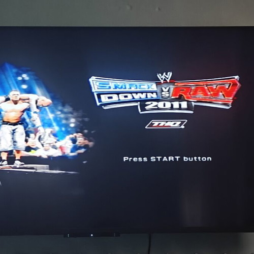 Smackdown Vs Raw 2011 PS2 game used, fighting genre