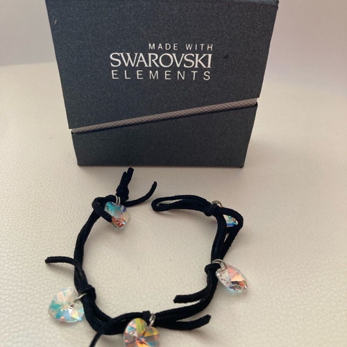 Swarovski bracelet used with 5 suede black hearts