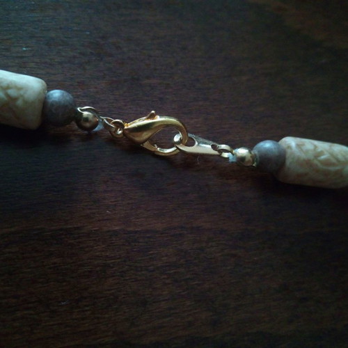 Ethnic necklace used carved bone and wood