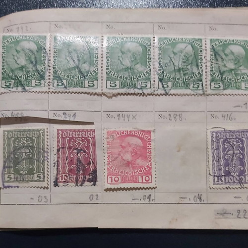 Stamp album used with Austrian stamps, all sealed with hinges