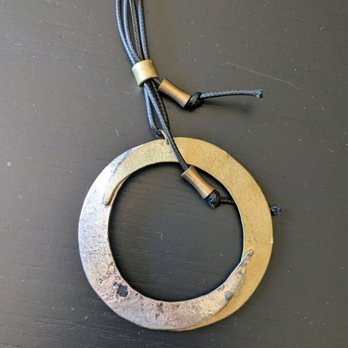 Long handmade necklace new with metal details and leather