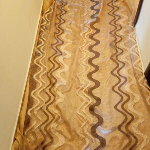 Double curtain like new with gold and geometric patterns