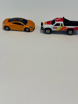 Toyota src and Nissan coupe like new, pack of 2 1:87 scale
