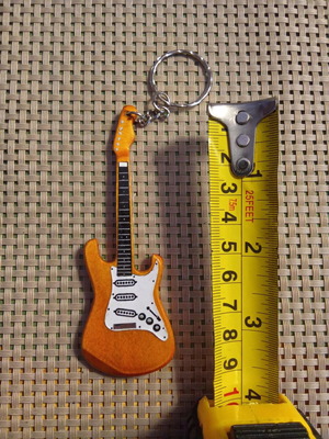 Electric guitar keychain new, orange color