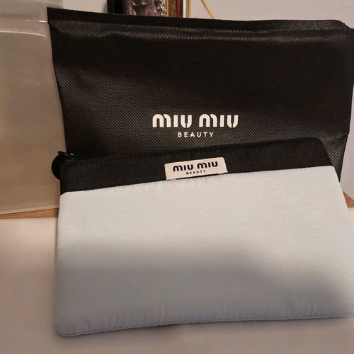 Miu Miu cosmetic pouch new, black and turquoise