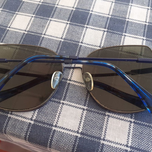 Sunglasses used in blue shade with metal frame