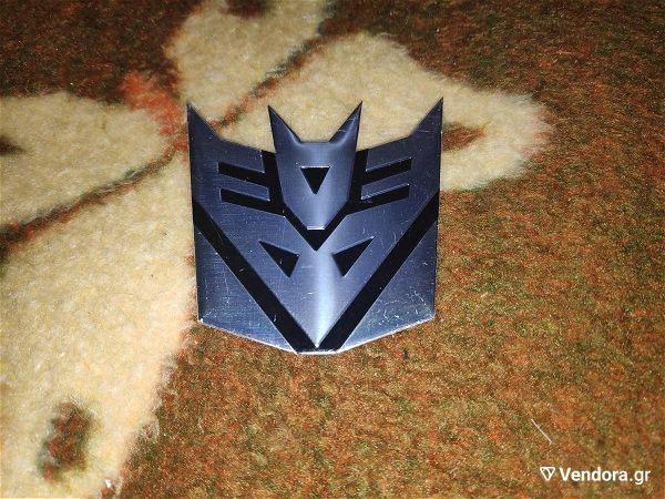  3D metalliko aftokollito aftokinitou Transformers Decepticons