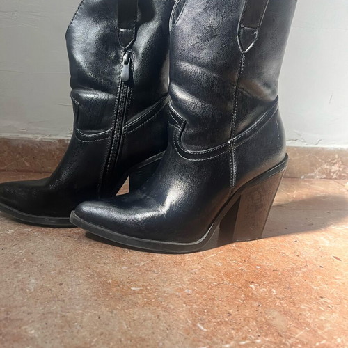 Cowboy boots used, slightly worn