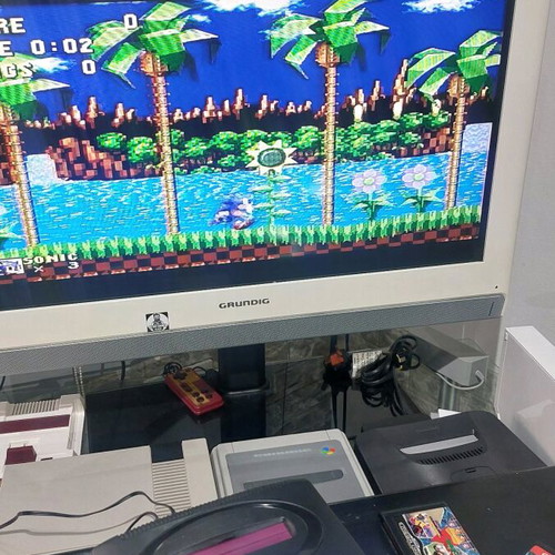 Retro 16-bit console like new with 2 controllers and Contra game