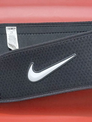 Nike weightlifting belt new with Velcro and metal ring