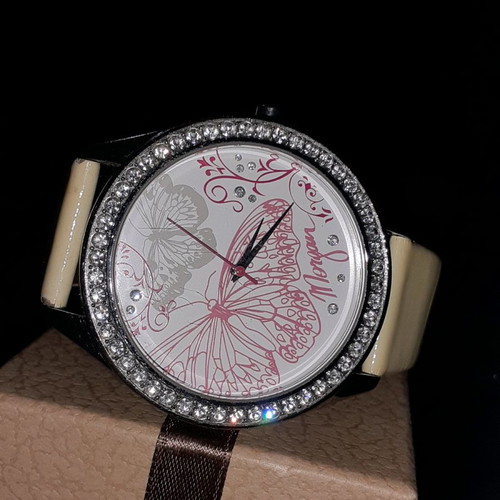 Morgan watch with replaced strap, functional with batteries