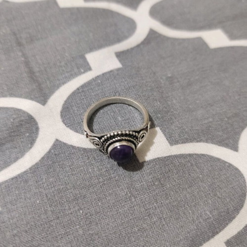 Ring with purple stone like new