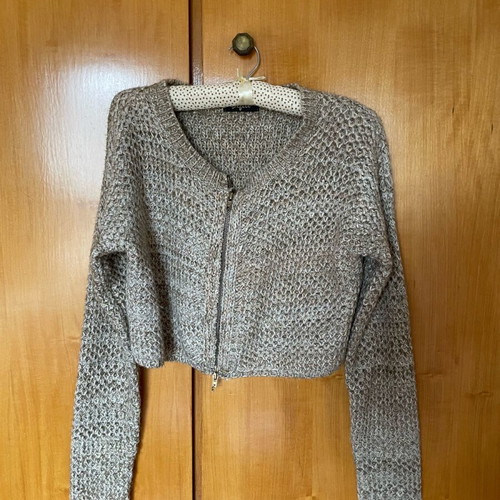 Knitted cardigan like new with golden thread in knit