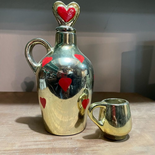 Pitcher and cup like new, shiny gold with hearts 1960