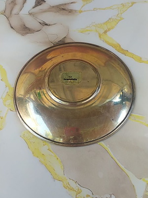 Decorative plate, possibly brass