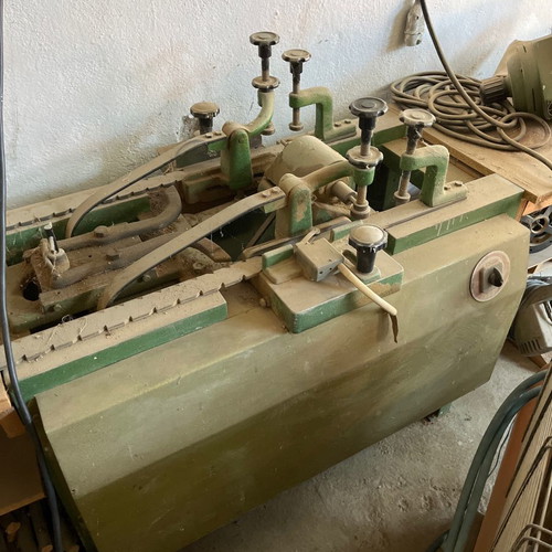 Woodworking machines used, set with bandsaw, planer, press