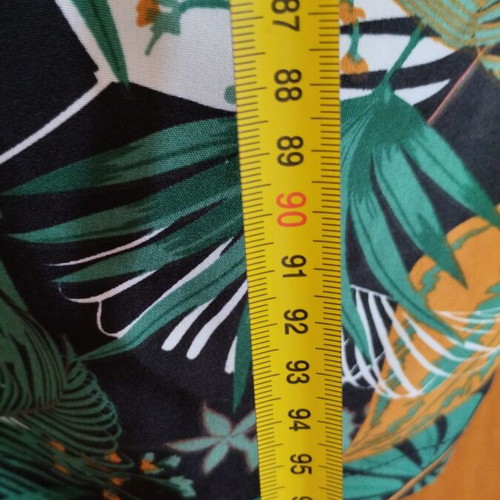 Pants with green and black tropical pattern new, size M