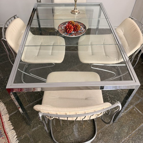 Italian kitchen table with leather chairs, stainless steel frame, used