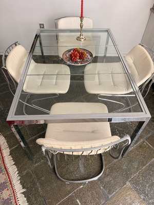 Italian kitchen table with leather chairs, stainless steel frame, used