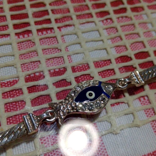 Silver 925 bracelet like new with blue eye and stones