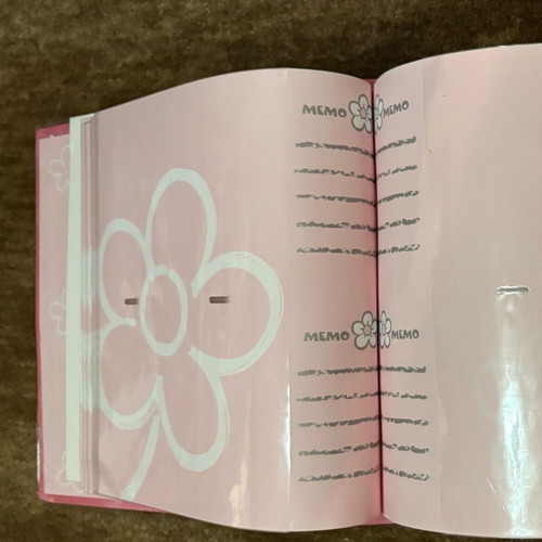 Photo albums in two different designs like new