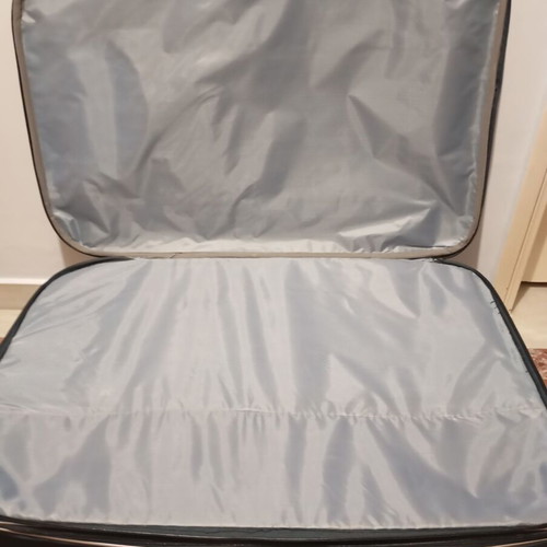 Lumi travel suitcase used with broken wheels