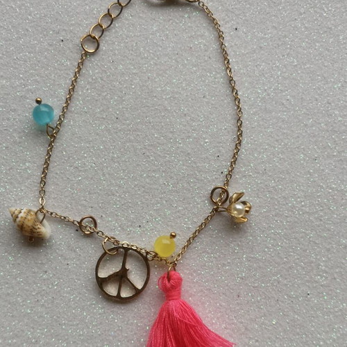 Bracelet like new with details and tassel
