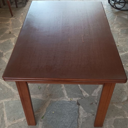 Wooden dining table used with extension