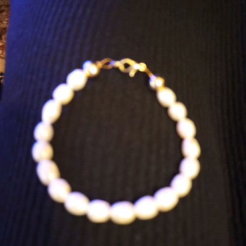 Jewelry set with faux pearls like new, necklace, bracelet and earrings