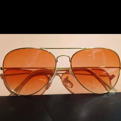 Miu Miu sunglasses used with case and cloth, black and gold