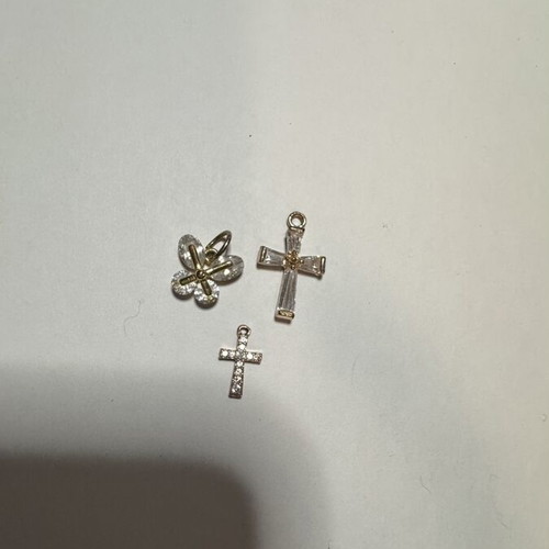 Cross pendants, gold color