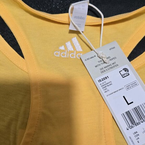 Adidas sleeveless t shirt new, yellow, size L