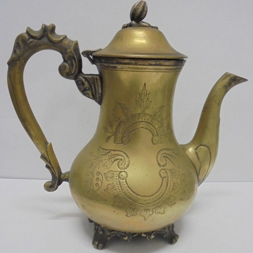 Old bronze teapot with decorative ornaments