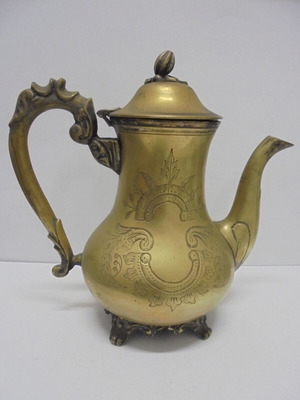 Old bronze teapot with decorative ornaments
