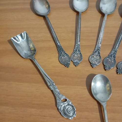 Assorted spoons used, vintage personal items