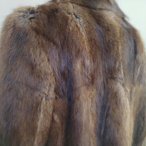 Women's coat made of natural fur new, brown and black