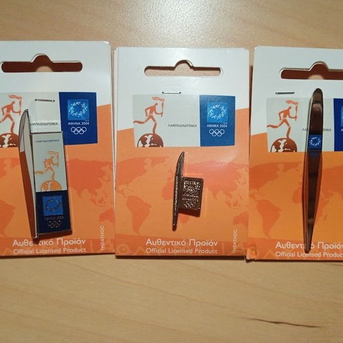 3 collectible pins with torches themed around the Athens 2004 Torch Relay