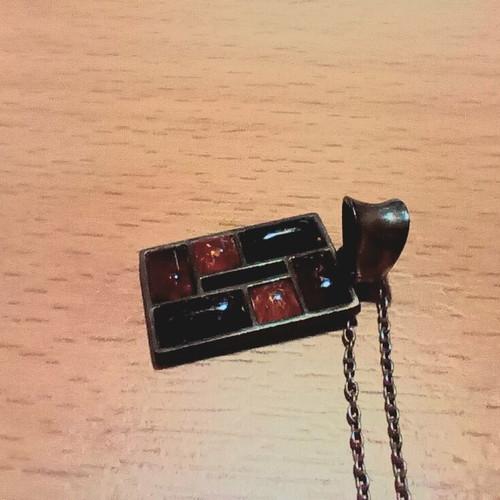 Silver pendant with Baltic amber like new