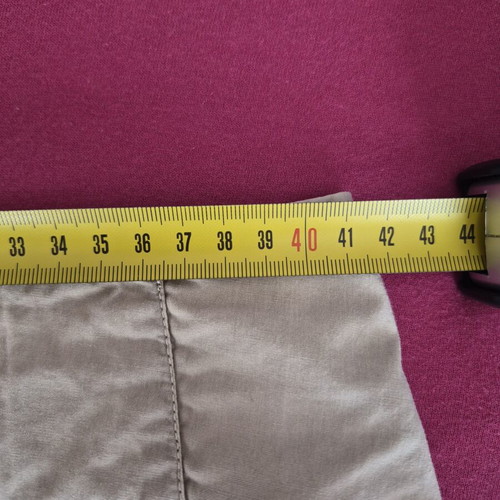 Mini skirt beige with pleats used, size M