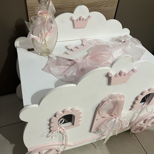 Wooden Baptism Carriage used, decorated with pink tulle