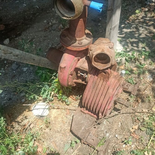 Tractor water pump used with check valve