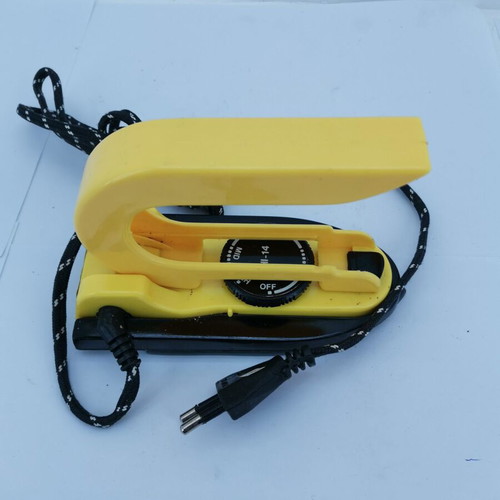 Travel iron used, year 2000