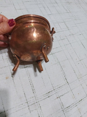 Vintage copper vessel used with brass ornaments and handle