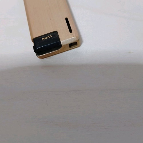 Win International vintage butane lighter used